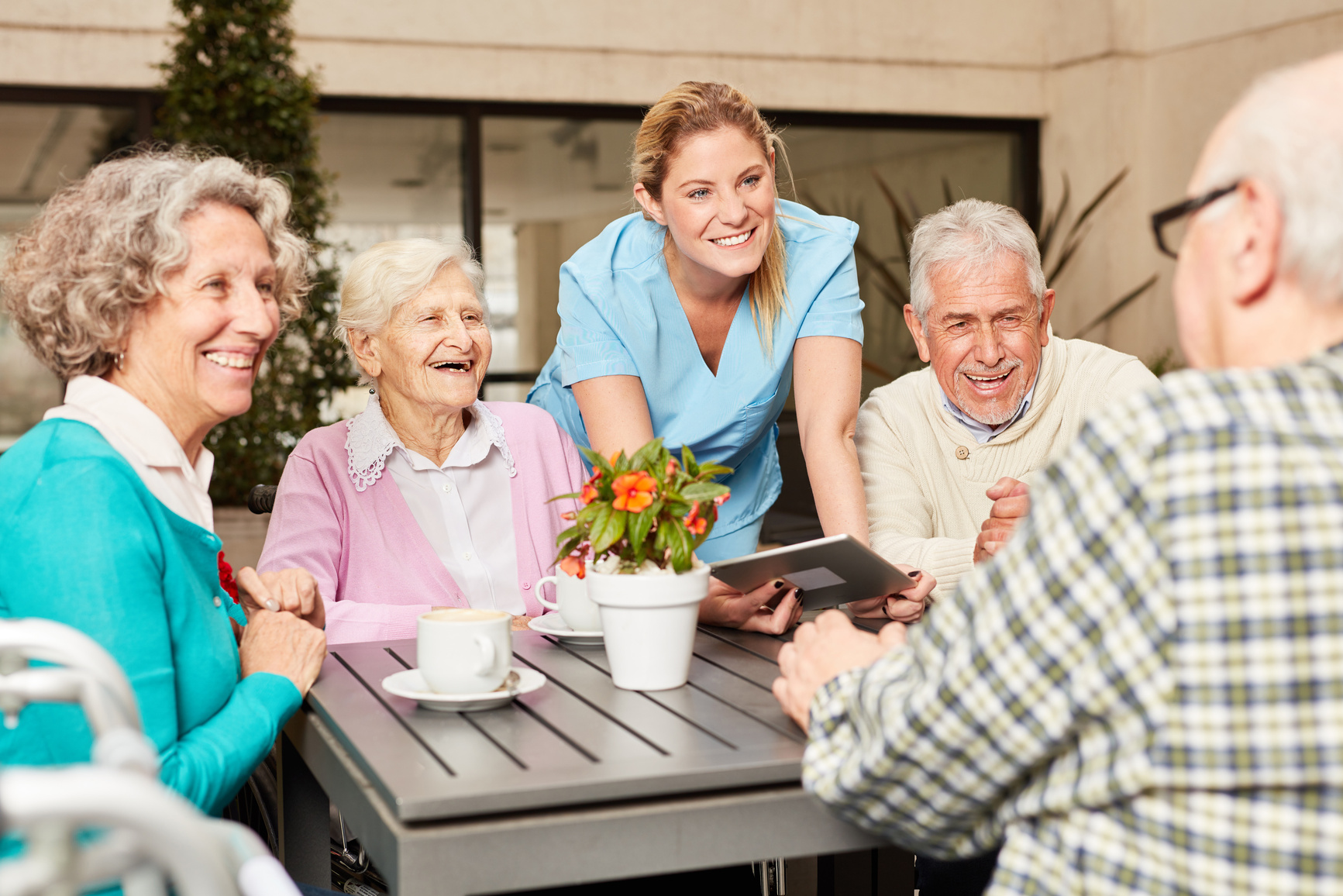 Senior Citizen and Caregiver with Tablet Computer